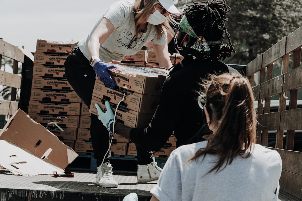 Community members and volunteers supporting a community facility